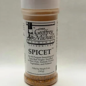 Spice seasoning bottle with white cap.