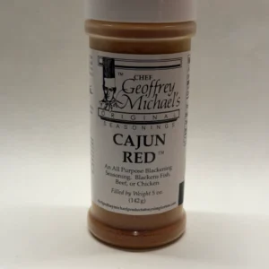 Cajun Red seasoning bottle on white background.