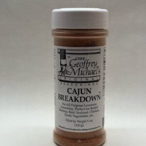 Cajun seasoning bottle with white label.
